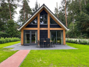 Cosy holiday home in a wooded area in Lochem